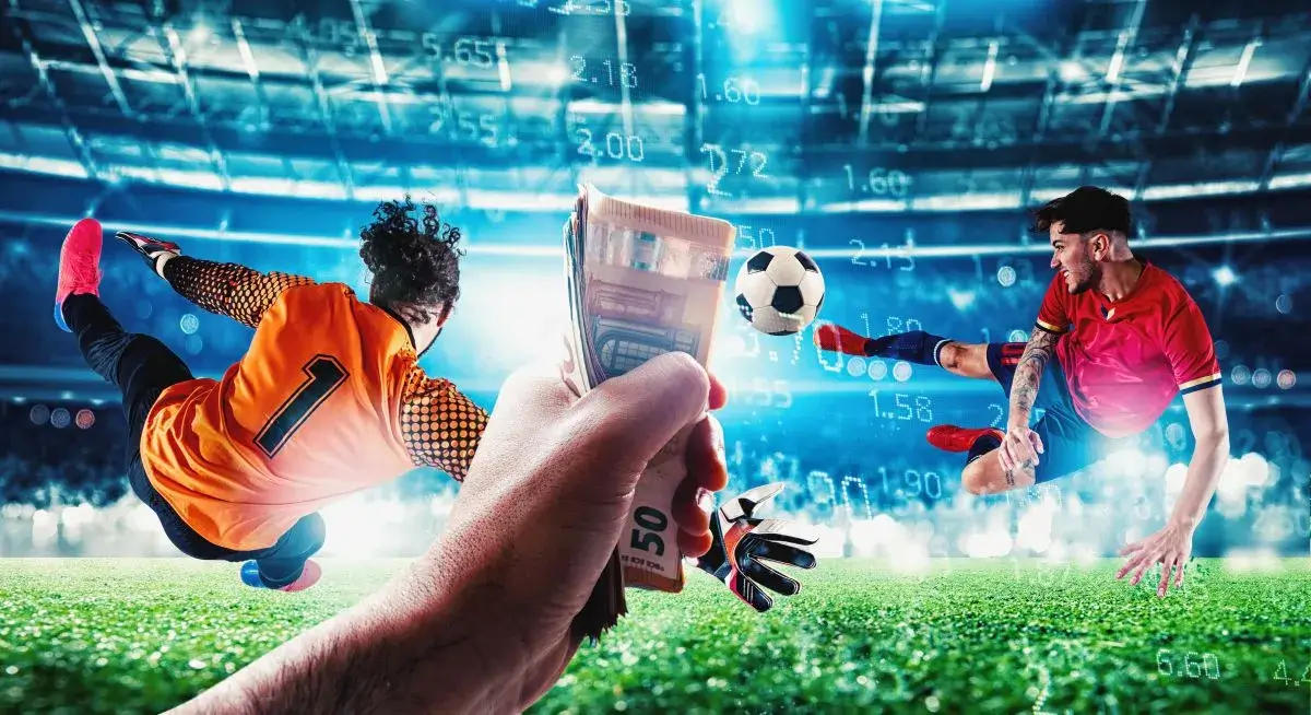 Mann streckt Hand mit Geldscheinen in Richtung von Fußballern aus - als Symbol für einen Reload Wettbonus